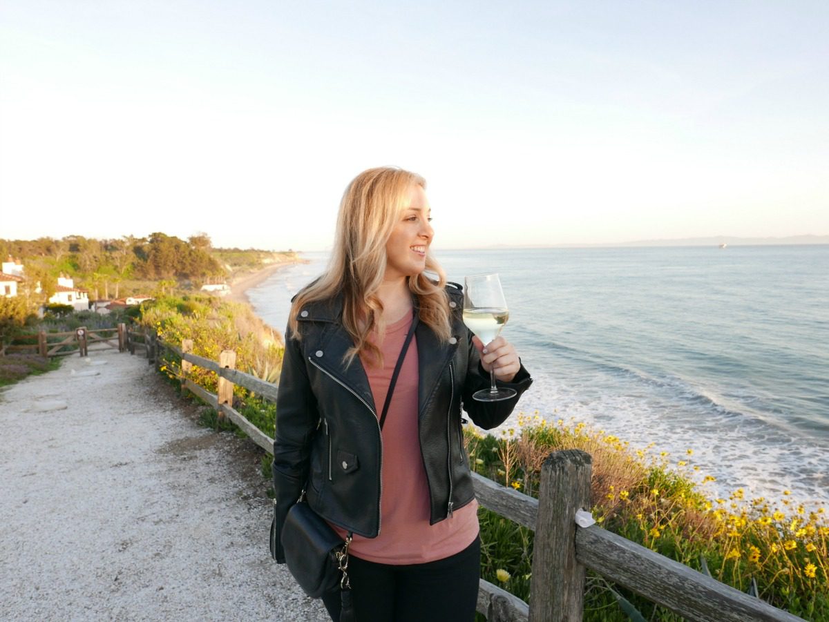 woman drinking wine outdoors