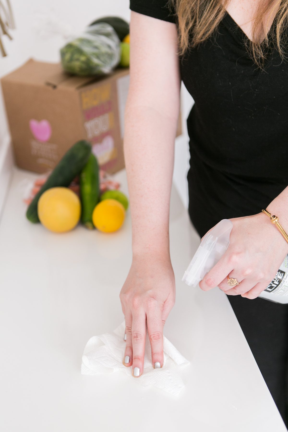 woman help the plant by using Better Life All-Purpose Cleaner