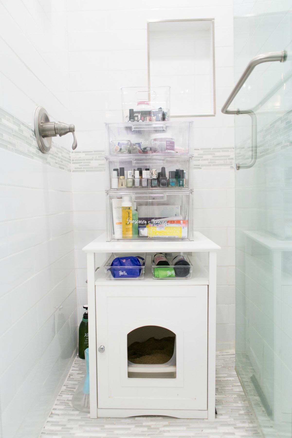bathroom with beauty products organizer