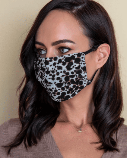 woman wearing animal print cloth face mask